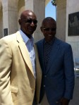 Former L.A. Rams running back Eric Dickerson (rt) and former Bears running back Gale Sayers (lt) at the Deacon Jones Memorial Service at the L.A. Coliseum last Summer.