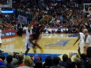 LeBron James was a blur scoring 31 points and dishing out 12 assists in Heat's 116-112 win over the Clippers.