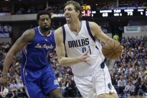 Clippers DeAndre Jordan (left) was snubbed for the West All-Star Team in favor of Dallas' Dirk Nowitzki (right). courtesy: LM Otero/AP